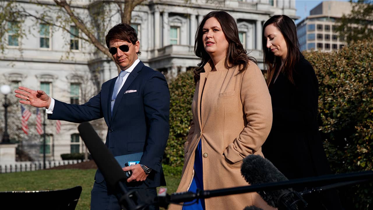 Photo of Deputy White House press secretary Hogan Gidley, left, White House director of broadcast media Alexa Henning, right, and White House press secretary Sarah Sanders
