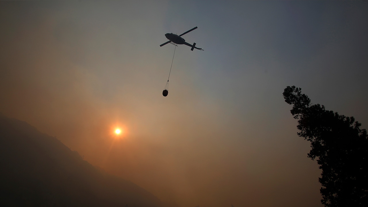 Photo of helicopter within the smoke of Yosemite wildfires