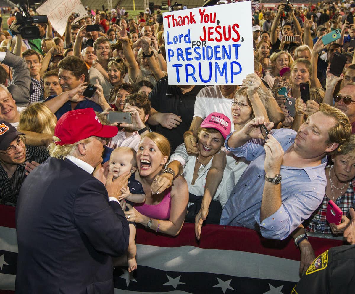 Photo of people at a Trump rally