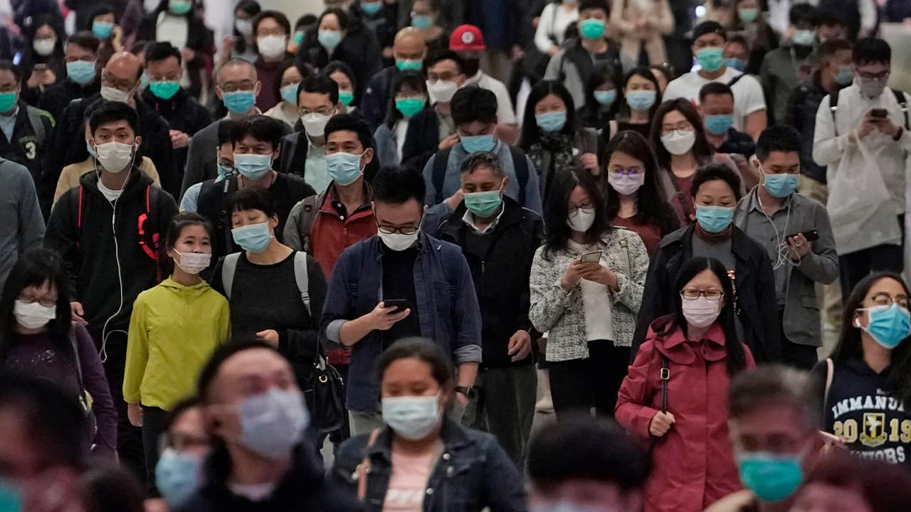 Photo of people wearing protective masks in Hong Kong