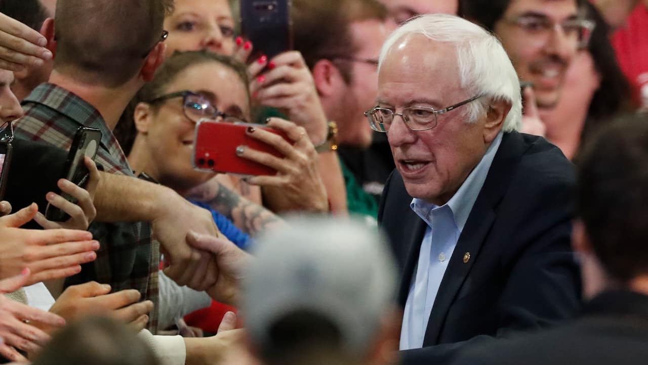 Photo of Bernie Sanders in a crowd fo people 