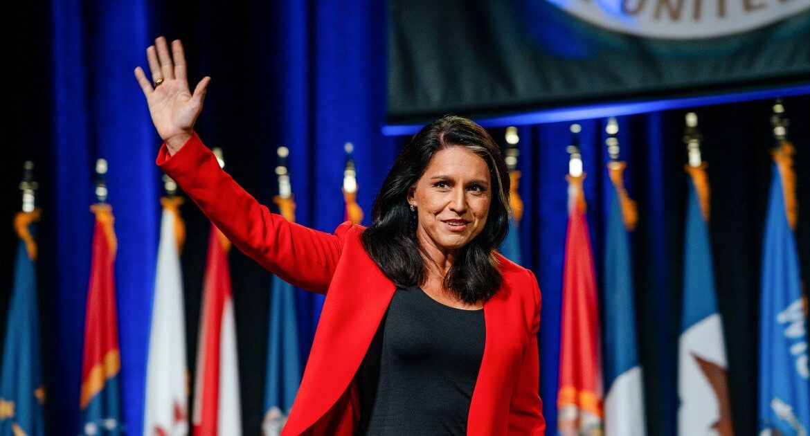 Former Rep. Tulsi Gabbard (D-Hawaii) arrives to speak in support of former President Donald Trump, the Republican presidential nominee, at the National Guard Association of the United States’ general conference in Detroit on Monday, Monday, Aug. 26, 2024. Trump plans to name Gabard and Robert F. Kennedy Jr., his onetime rival, as honorary co-chairs of a presidential transition team, according to a campaign senior adviser. (Uli Seit/The New York Times) (Nick Hagen/The New York Times)