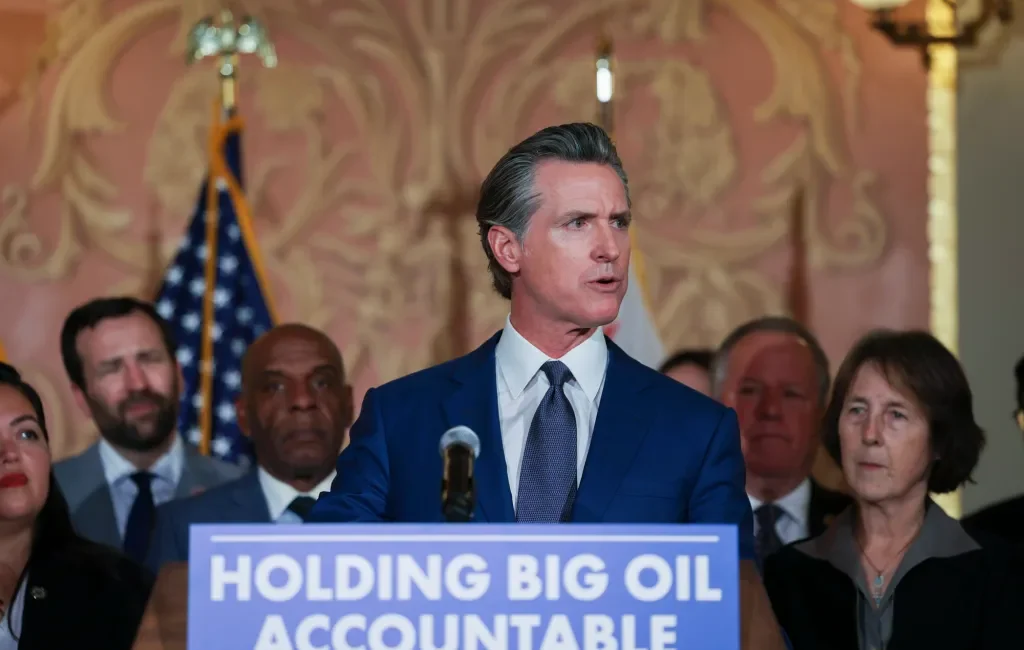Gov. Gavin Newsom speaks at an event in anticipation of signing a bill on his proposed oil profit penalty plan in Sacramento on March 28, 2023. (CalMatters/ Miguel Gutierrez Jr.)