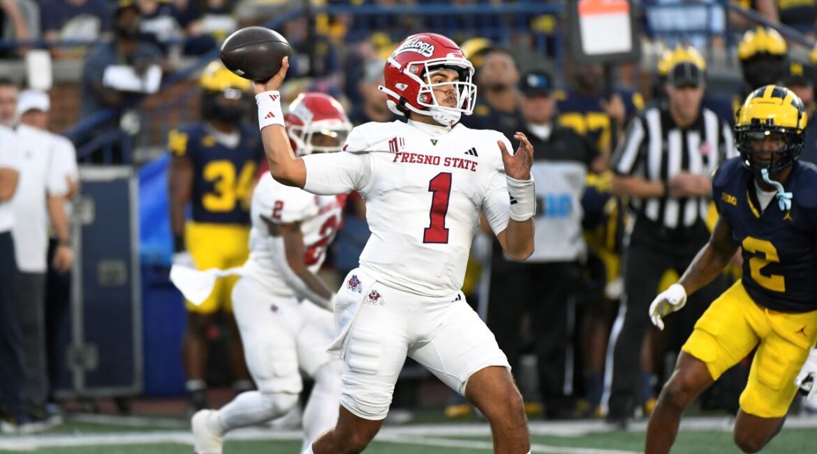 Fresno State quarterback Mikey Keene throws against Michigan in the first half of an NCAA college football game, Saturday, Aug. 31, 2024, in Ann Arbor, Mich. (AP Photo/Jose Juarez)