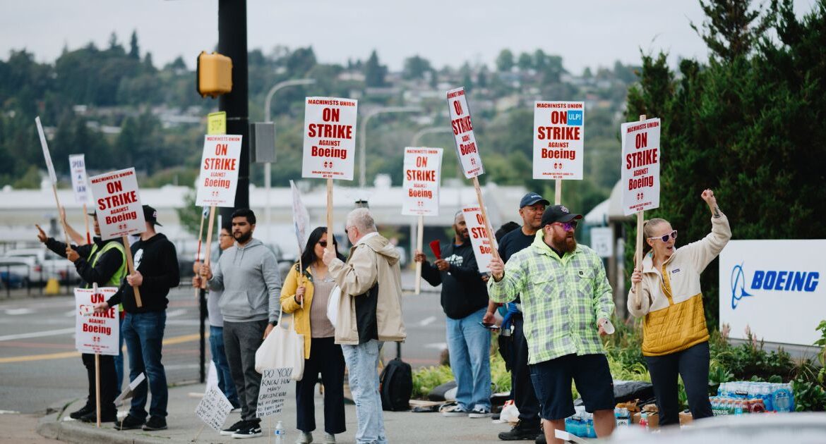 Demonstrators on the first day of a strike by thousands of workers outside of the Boeing facility in Renton, Wash., Sept. 13, 2024. Boeing and its largest union are expected to restart contract negotiations on Tuesday with the help of federal mediators, days after thousands of workers rejected a previous offer and went on strike.