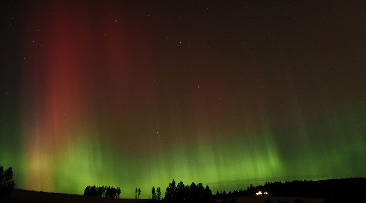 An aurora borealis, also known as the northern lights, is seen in the night sky along with the Big Dipper constellation on Thursday, Oct. 10, 2024, in Moscow, Idaho. (AP Photo/Ted S. Warren)