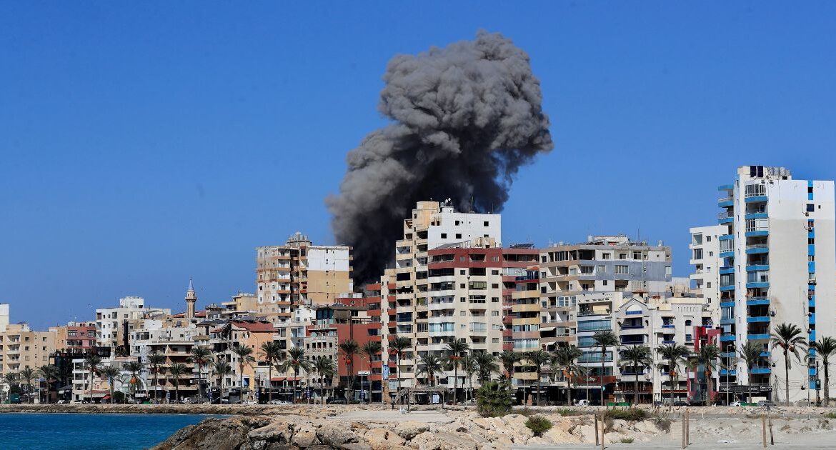 Smoke rises from buildings hit in an Israeli airstrike in Tyre, Lebanon, Wednesday, Oct. 23, 2024. (AP/Mohammad Zaatari)