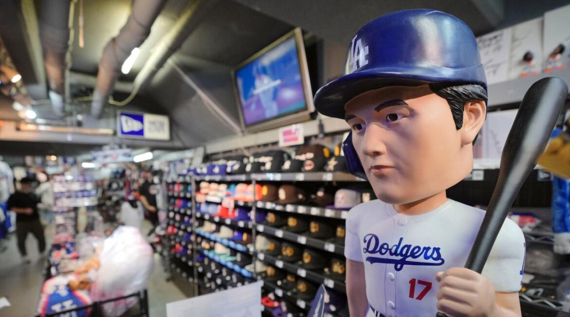 Goods related to Shohei Ohtani of the Los Angeles Dodgers are displayed at a sporting goods store, "SELECTION," in Shinjuku district Wednesday, Oct. 23, 2024 in Tokyo. (AP Photo/Eugene Hoshiko)