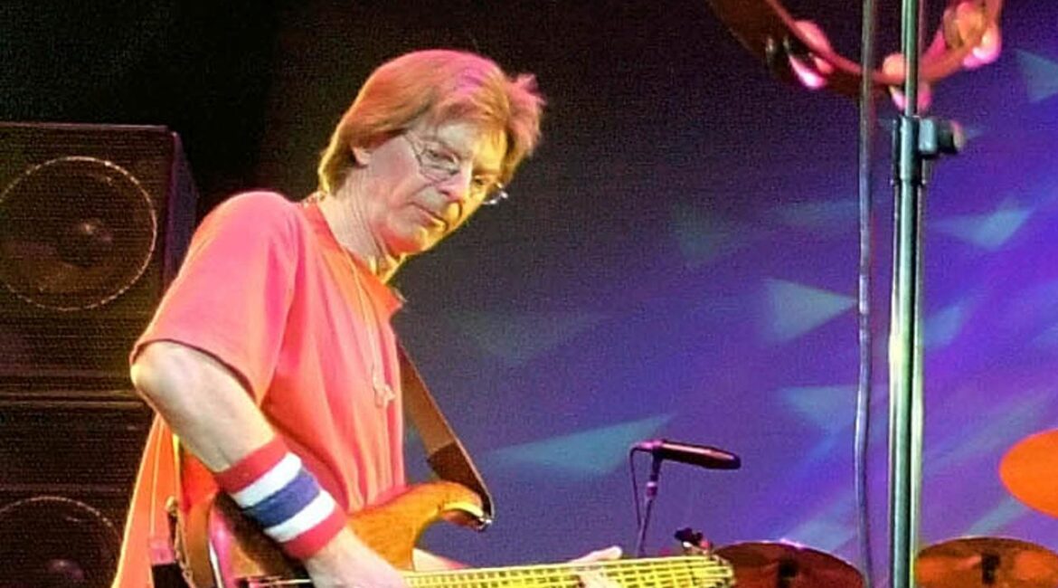 FILE - Phil Lesh, of The Grateful Dead, performs during a reunion concert in East Troy, Wis. on Aug. 3, 2002. Lesh, a founding member of the Grateful Dead, died Friday, Oct. 25, 2024, at age 84. (AP Photo/Morry Gash, File)
