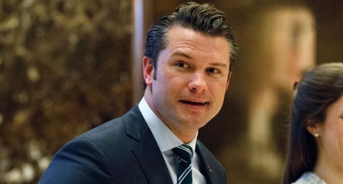 Pete Hegseth walks to an elevator for a meeting with President-elect Donald Trump at Trump Tower in New York, Dec. 15, 2016. (AP File)