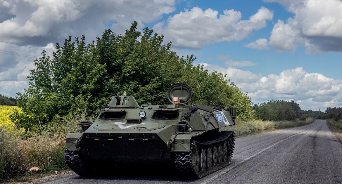A Ukrainian armored vehicle drives on the main road near the Russian border towards Russia’s Kursk region from Ukraine’s Sumy region, Aug. 12, 2024. President-elect Donald Trump may accelerate the timetable for a truce. Kyiv views guarantees against renewed aggression as crucial to any settlement. (David Guttenfelder/The New York Times)