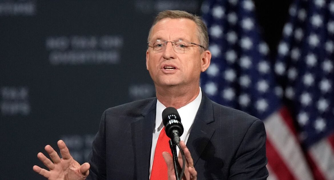 Former Rep. Doug Collins speaks before Republican presidential nominee former President Donald Trump at a campaign event at the Cobb Energy Performing Arts Centre, Tuesday, Oct. 15, 2024, in Atlanta. (AP Photo/John Bazemore)
