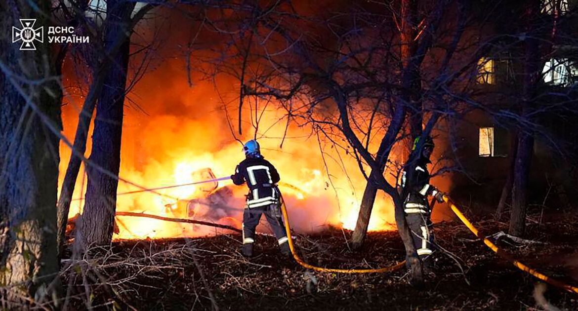 In this photo provided by the Ukrainian Emergency Service, firefighters extinguish the fire following a Russian rocket attack that hit a multi-storey apartment building in Sumy, Ukraine, Sunday, Nov. 17, 2024. (Ukrainian Emergency Service via AP)