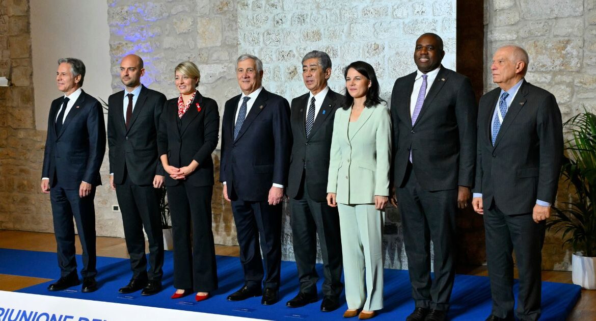 From left, US Secretary of State Antony Blinken, France's Foreign Affairs Minister Jean-Noel Barrot, Canada's Foreign Affairs Minister Melanie Joly, Italy's Foreign Minister Antonio Tajani, Japan's Foreign Minister Takeshi Iwaya, Germany's Foreign Affairs Minister Annalena Baerbock, Britain's Foreign Secretary David Lammy and High Representative of the European Union for Foreign Affairs and Security Policy Josep Borrell pose for a family photo at the G7 Foreign Ministers meeting in Anagni, central Italy, Monday, Nov. 25, 2024. (Andreas Solaro/Pool Photo via AP)