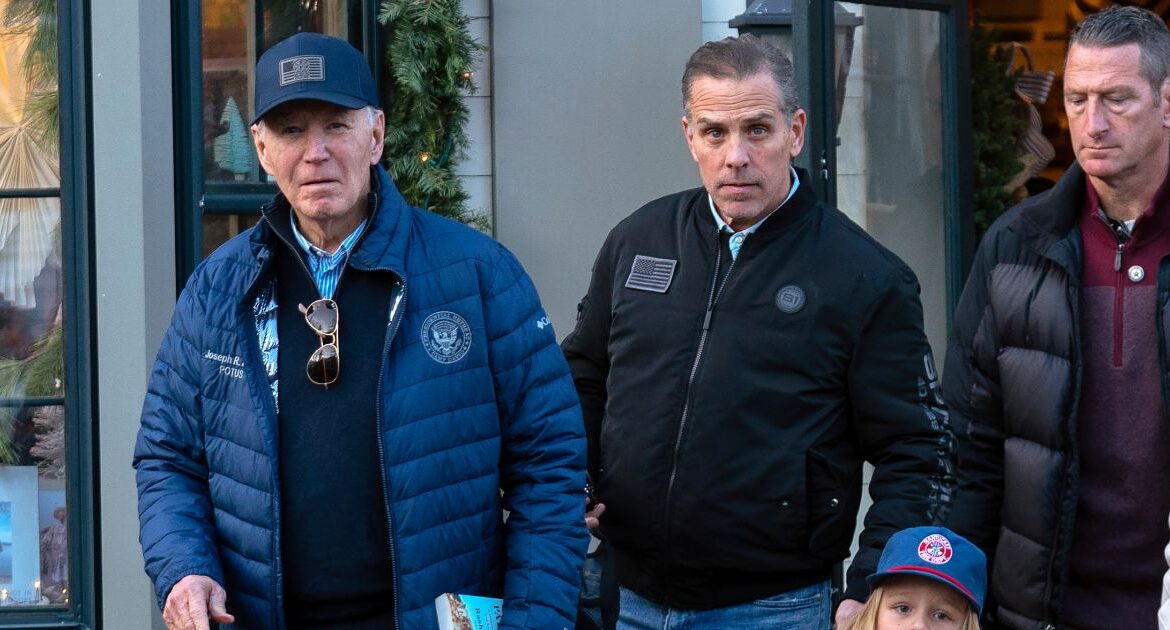 President Joe Biden accompanied by his son Hunter Biden and his grandson Beau leave a book store as they walk in downtown Nantucket Mass., Friday, Nov. 29, 2024. (AP Photo/Jose Luis Magana)