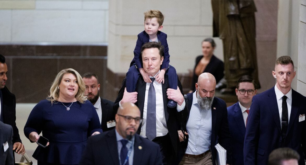 Elon Musk, a co-leader of the so-called Department of Government Efficiency, center, carries his son X Æ A-Xii Musk following a meeting with lawmakers on Capitol Hill in Washington, on Dec. 5, 2024. Musk, the world’s richest man, spent over a quarter of a billion dollars in the final months of this year’s election to help Donald J. Trump win the presidency, federal filings revealed on Thursday. (Tom Brenner/The New York Times)