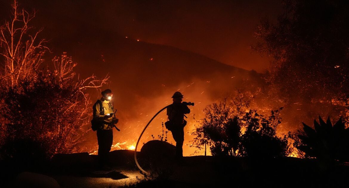 Firefighters battle the Franklin Fire in Malibu, Calif., Tuesday, Dec. 10, 2024. (AP/Jae C. Hong)