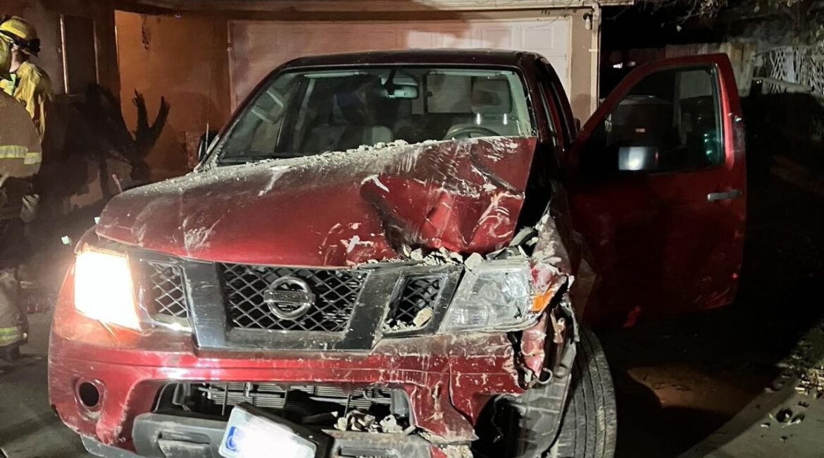A 14-year-old girl was arrested after crashing her grandparents' car into a house in Visalia, facing multiple charges including reckless driving and driving without a license. (Visalia PD)