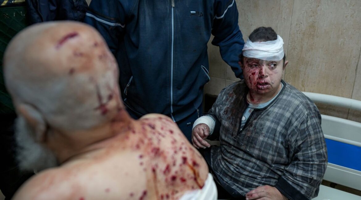 Palestinians, wounded in the Israeli bombardment of the Gaza Strip, receive treatment at the Al-Aqsa Hospital in Deir al-Balah, Monday, Dec. 16, 2024. (AP Photo/Abdel Kareem Hana)