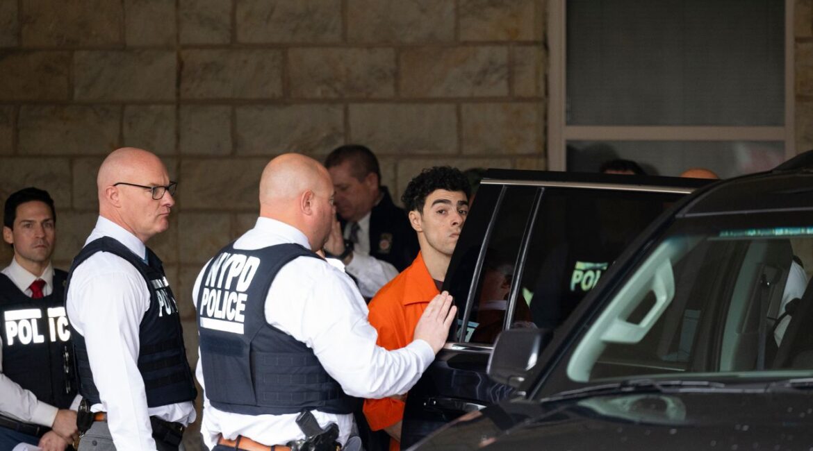 Luigi Mangione exits the Blair County courthouse after his extradition hearing in Hollidaysburg, Pa., on Thursday, Dec. 19, 2024. Mangione, the 26-year-old man accused of murdering a health care executive in Manhattan, agreed on Thursday to be extradited to New York, where he will face a first-degree murder charge. (Rachel Wisniewski/The New York Times)