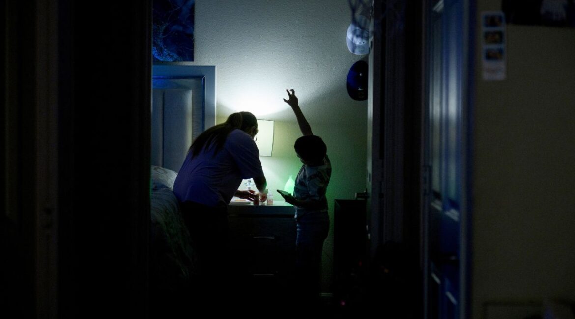 An autistic boy with his mother at home in Texas, Aug. 5, 2023. There is no blood test or brain scan to determine who has autism, and with no singular cause, there is no singular culprit behind autism’s rise. (Callaghan O'Hare/The New York Times)