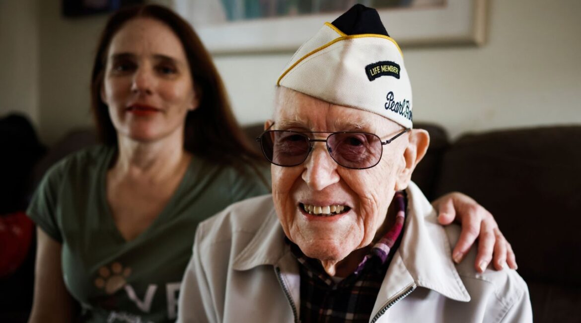 Warren Upton sits for a portrait with his daughter Barbara Upton at his home in San Jose, Calif., on Friday, Nov. 26, 2021. (Shae Hammond/Bay Area News Group via AP)