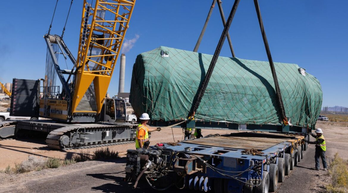Workers move an electrolyzer, which generates hydrogen from water using electricity, at a storage facility in Delta, Utah on Oct. 5, 2023. The Biden administration on Jan. 3, 2025 made final its long-awaited plan to offer billions of dollars in tax credits to companies that make hydrogen, in the hopes of building up a new industry that might help fight climate change. (Nina Riggio/The New York Times)