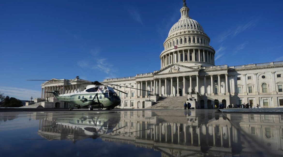 The Marine One helicopter outside the U.S. Capitol, where President-elect Donald Trump will be inaugurated in Washington on Monday, Jan. 20, 2025. The incoming president’s team said he would take unilateral action on a variety of fronts during his first hours in office, including 10 executive orders cracking down on immigration and immigrants. (Chang W. Lee/The New York Times)