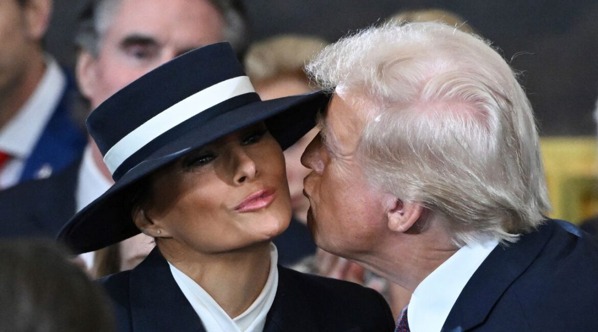 President-elect Donald Trump kisses Melania Trump before the 60th Presidential Inauguration in the Rotunda of the U.S. Capitol in Washington, Monday, Jan. 20, 2025. (Saul Loeb/Pool photo via AP)