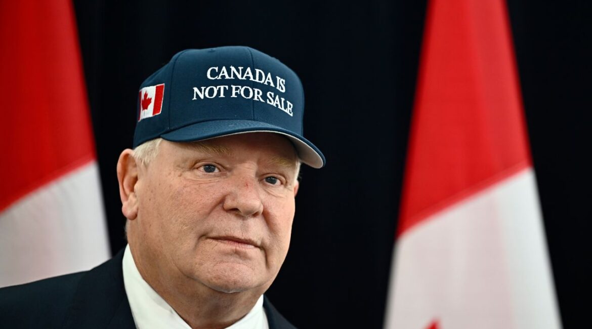 Ontario Premier Doug Ford, wearing a 'Canada Is Not For Sale' hat, speaks as he arrives for a first ministers meeting in Ottawa on Wednesday, Jan. 15, 2025. (AP File)