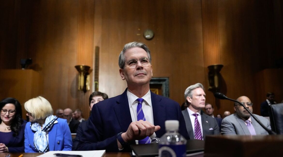 Scott Bessent, President-elect Donald Trump's choice to be Secretary of the Treasury, appears before the Senate Finance Committee for his confirmation hearing, at the Capitol in Washington, Thursday, Jan. 16, 2025. (AP Photo/Ben Curtis)