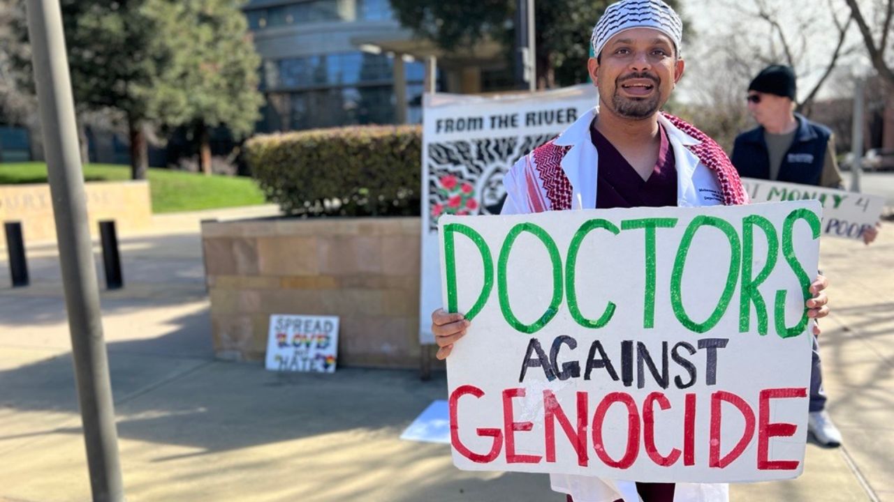 Dr. Mohammad Shaikh held a sign saying "Doctors Against Genocide" at a protest in Fresno on Wednesday, Feb. 5, 2025. (GV Wire/Anthony W. Haddad)