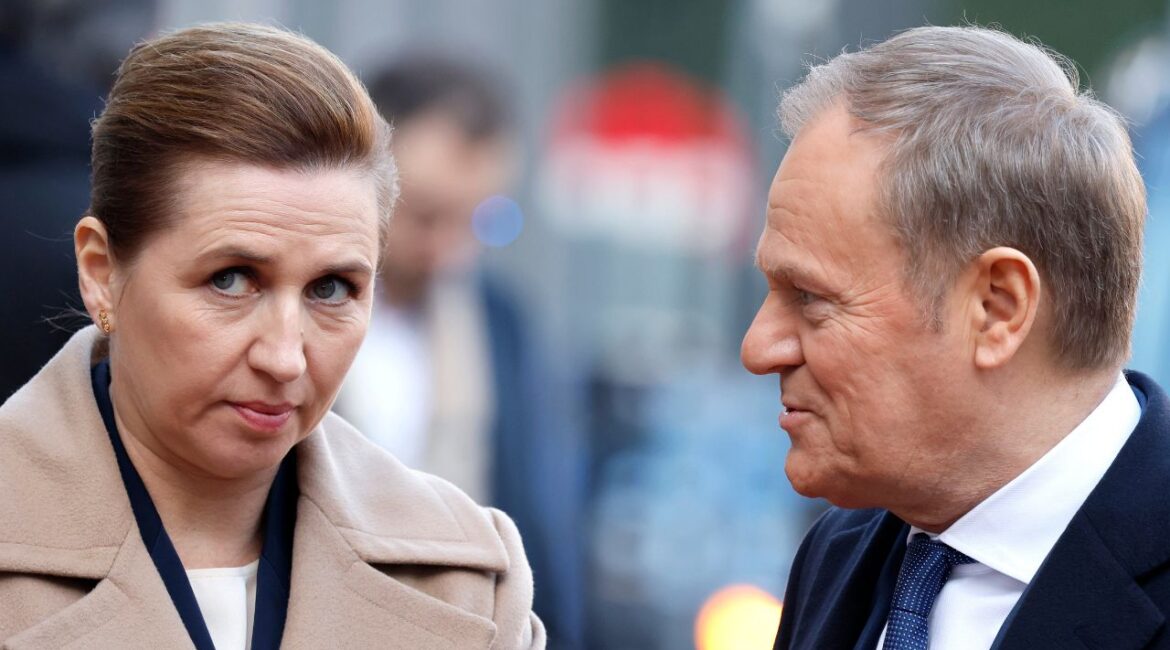 Denmark's Prime Minister Mette Frederiksen, left, speaks with Poland's Prime Minister Donald Tusk as they arrive for an EU summit at the Egmont Palace in Brussels, Monday, Feb. 3, 2025. (AP/Geert Vanden Wijngaert)