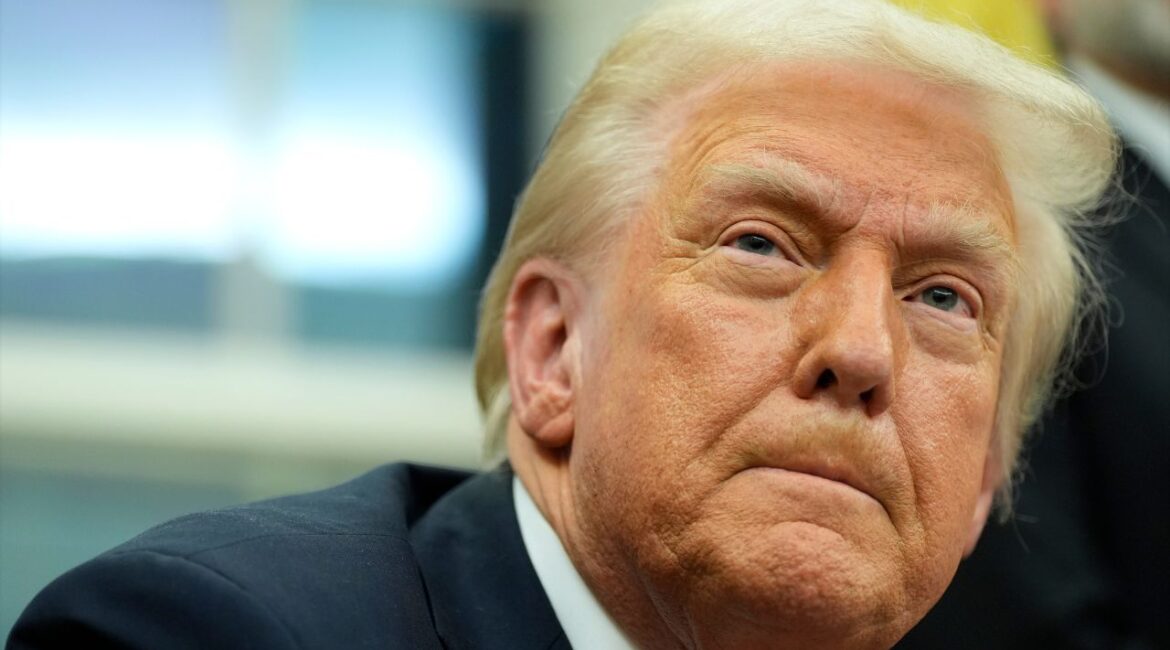 President Donald Trump listens to a question from a reporter as he signs executive orders in the Oval Office at the White House, Monday, Feb. 10, 2025, in Washington. (Photo/Alex Brandon)
