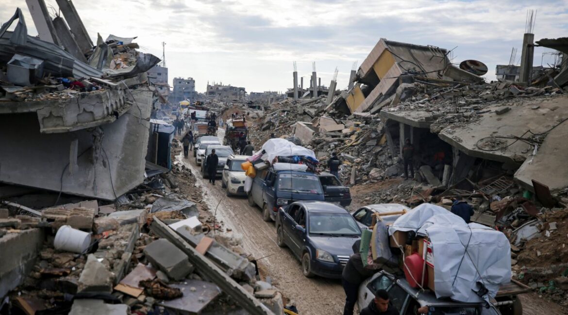 Displaced Palestinians make their way from central Gaza to their homes in the northern Gaza Strip, Monday, Feb. 10, 2025. (AP/Jehad Alshrafi)