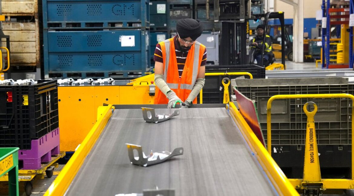 An employee works on the production line at the Martinrea auto parts manufacturing plant that supplies auto parts to Canada and U.S. plants, in Woodbridge, Ontario, Monday, Feb. 3, 2025. (AP File)