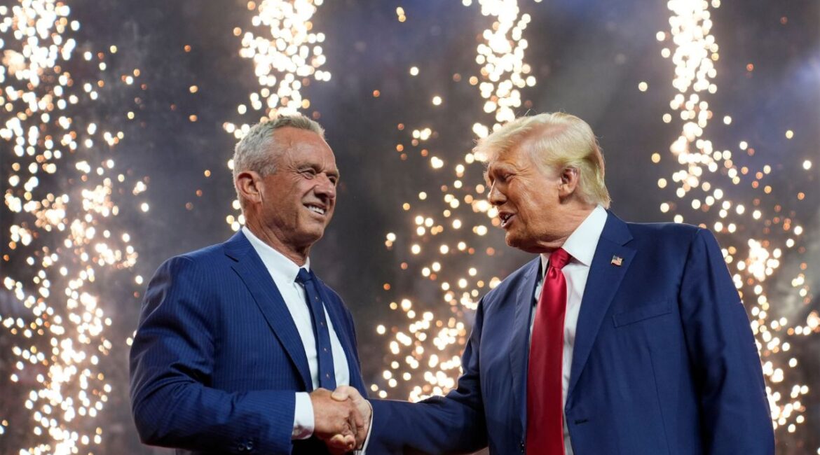 Republican presidential nominee former President Donald Trump shakes hands with Independent presidential candidate Robert F. Kennedy Jr. at a campaign rally at the Desert Diamond Arena, Friday, Aug. 23, 2024, in Glendale, Ariz. (AP File)