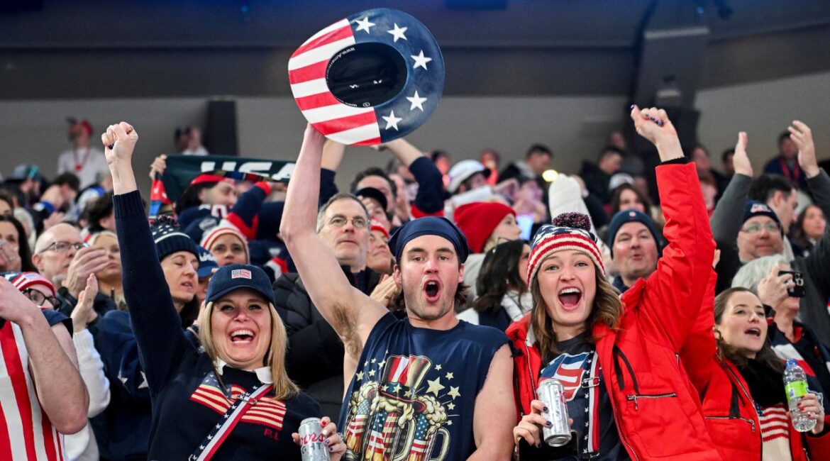 Team United States fans cheer after their team defeated Canada in a 4 Nations Face-Off hockey game in Montreal, Saturday, Feb. 15, 2025. (Graham Hughes/The Canadian Press via AP)