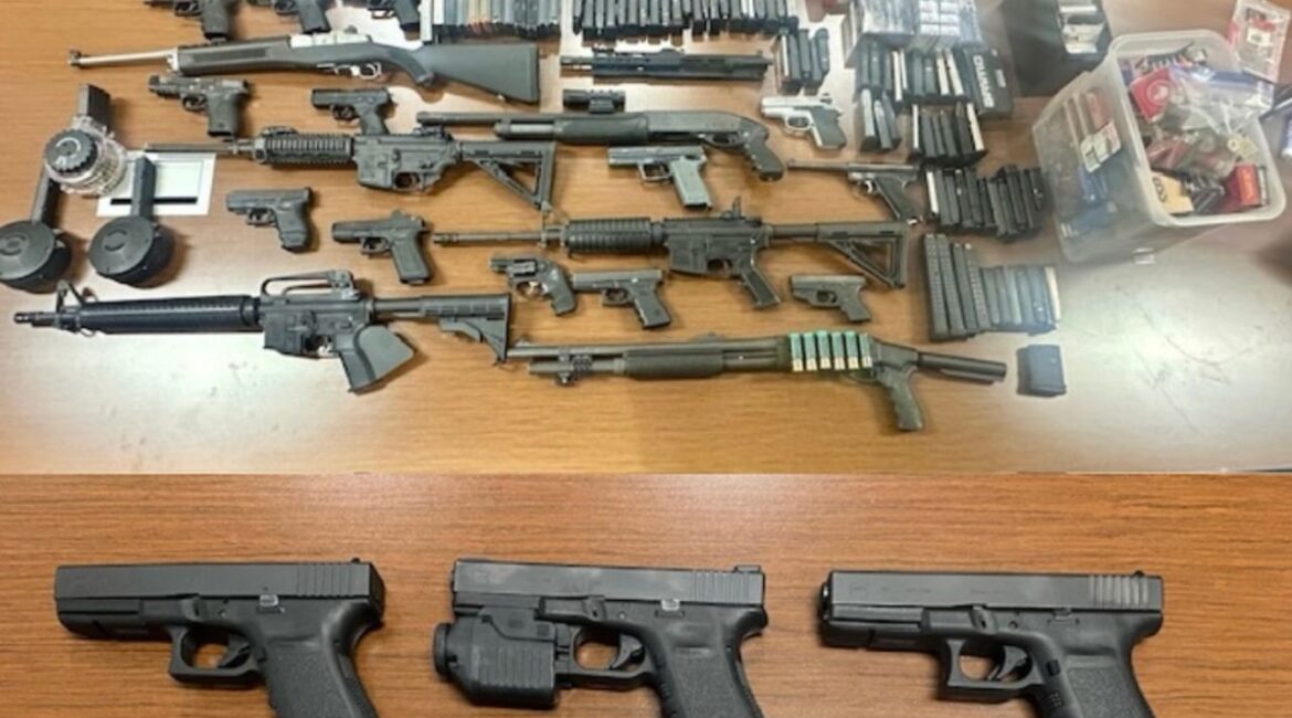 Authorities arrested a suspect in Fresno after seizing 27 firearms, including assault weapons and high-capacity magazines, during a search warrant operation. (Fresno PD)
