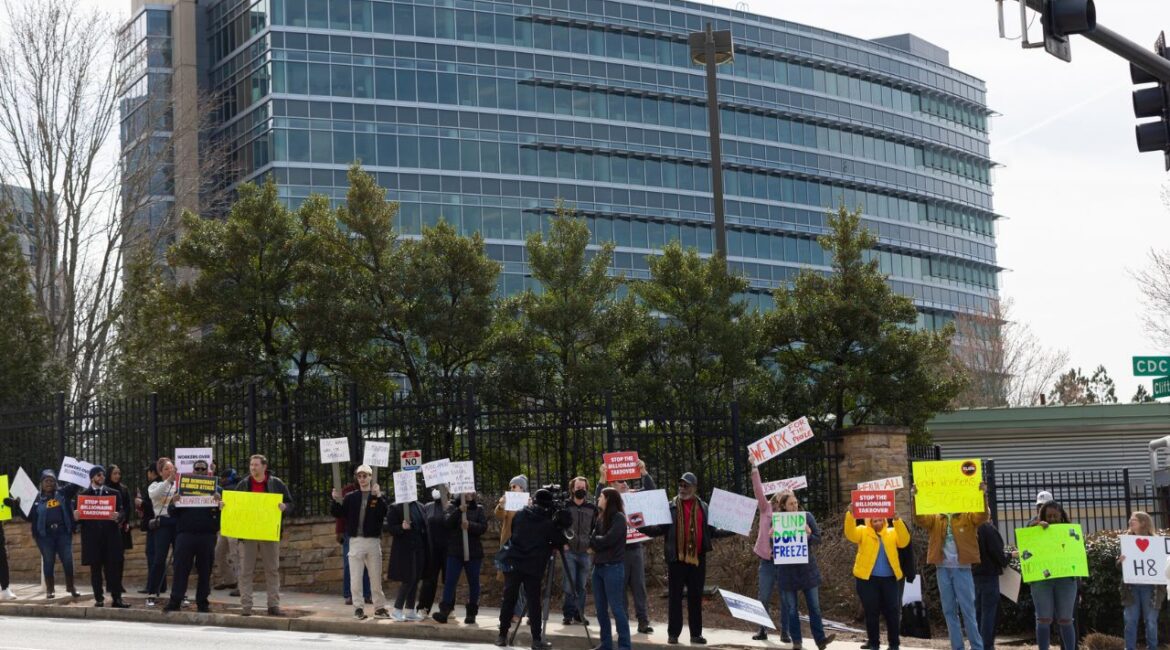 Demonstrators protest Centers for Disease Control and Prevention (CDC) layoffs in front of the CDC headquarters in Atlanta, Feb. 18, 2025. (AP File)