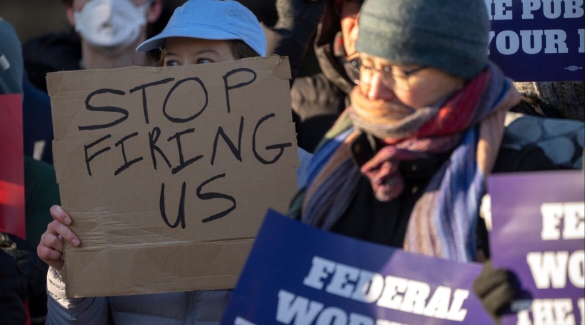 Demonstrators rally in support of federal workers outside of the Department of Health and Human Services, Feb. 14, 2025, in Washington. (AP File)