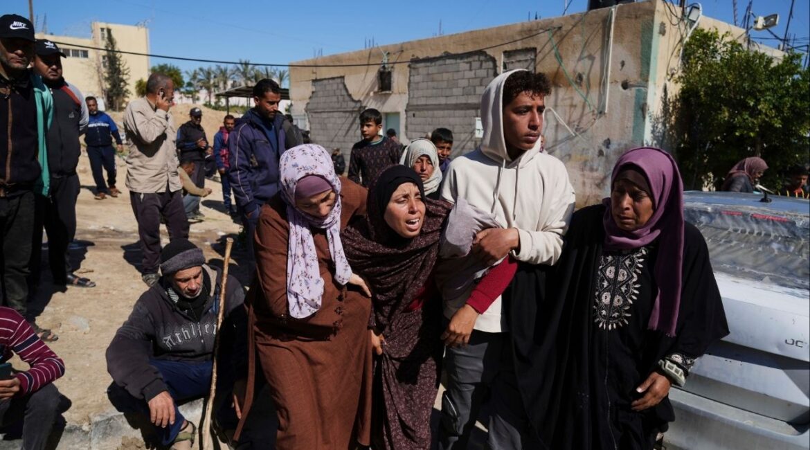Mourners react during the funeral of Palestinians killed in the Israeli bombardment of the Gaza Strip at Nasser Hospital in Khan Younis, Sunday, March 23, 2025. (AP/Abdel Kareem Hana)