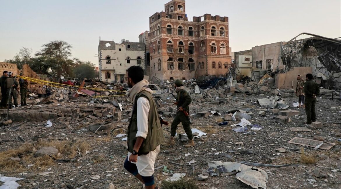 Locals inspect the site reportedly struck by U.S. airstrikes overnight in Sanaa, Yemen, Thursday, March 20, 2025. (AP Photo)