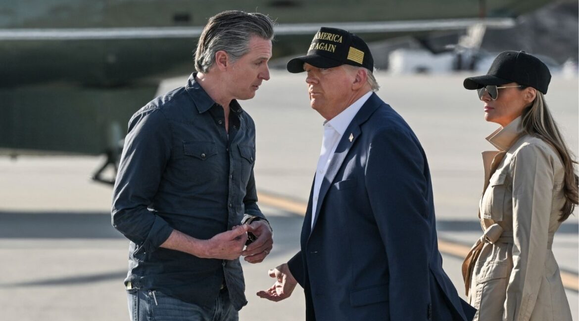 President Donald Trump speaks with Gov. Gavin Newsom after arriving at the Los Angeles Airport, on Friday, Jan. 24, 2025. The Trump administration will investigate whether a new California law banning parental notification requirements in schools violates federal policy. (Kenny Holston/The New York Times)