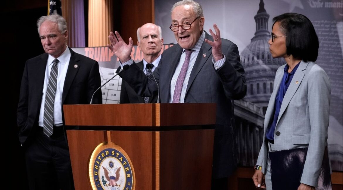 Senate Minority Leader Chuck Schumer, D-N.Y., center, is joined from left by Sen. Tim Kaine, D-Va., Sen. Peter Welch, D-Vt., and Sen. Angela Alsobrooks, D-Md., as they speak to reporters about President Donald Trump's tariffs on foreign countries, at the Capitol, in Washington, Wednesday, April 2, 2025. (AP Photo/J. Scott Applewhite)