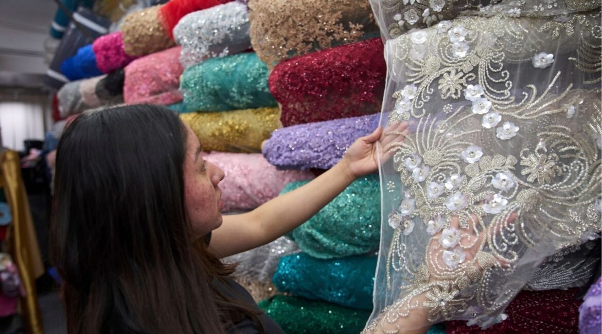 A hand-embroidery dress fabric made in India, costing a couple hundred dollars per yard, is sold at the Francia Textiles fabric store in the Fashion District in Los Angeles on Thursday, April 3, 2025. (AP Photo/Damian Dovarganes)