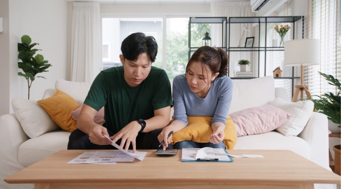 Americans' financial confidence is low as rising costs, government cuts, and tariffs threaten economic stability and consumer spending. (Shutterstock)