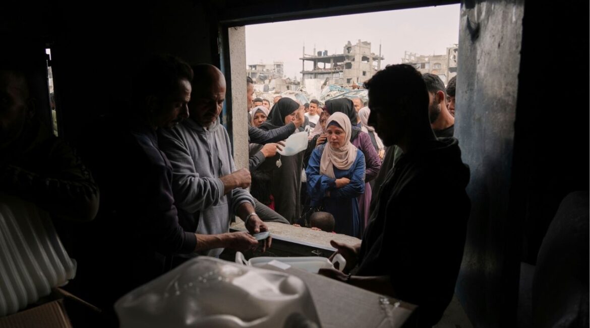 Palestinians receive humanitarian aid distributed by UNRWA, the U.N. agency helping Palestinian refugees in Jabaliya, Gaza Strip on Wednesday, April 9, 2025. (AP/Jehad Alshrafi)