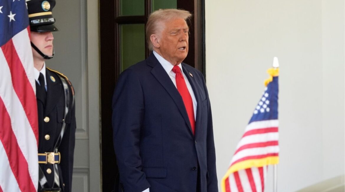 President Donald Trump waits to greet El Salvador's President Nayib Bukele at the White House, Monday, April 14, 2025, in Washington. (AP/Manuel Balce Ceneta)