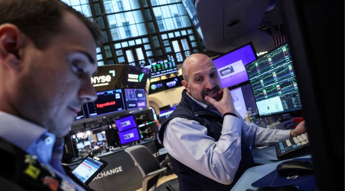 Traders work on the floor at the New York Stock Exchange (NYSE) in New York City, U.S., April 14, 2025. (REUTERS/Brendan McDermid)